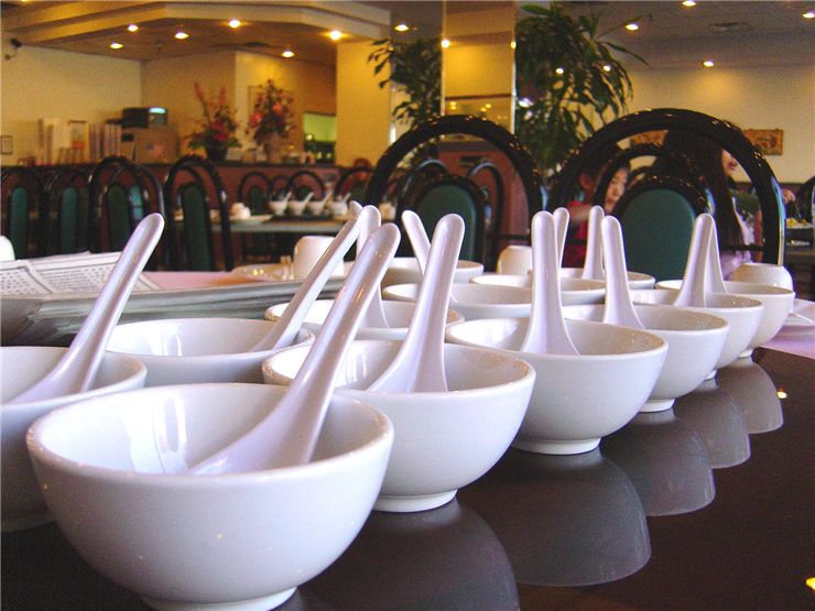 Picture Of Bowls And Spoons In Chinese Restaurant